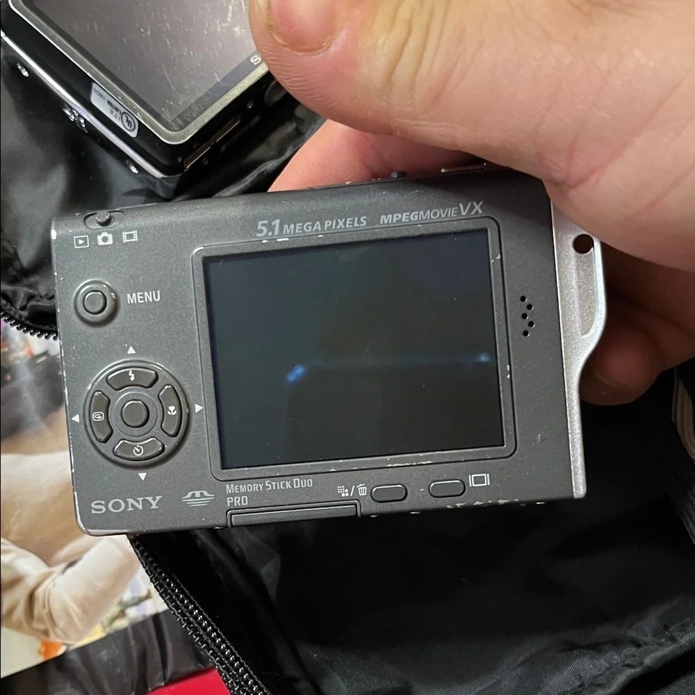 Sony Black and Silver Compact Digital Camera with Case and Accessories